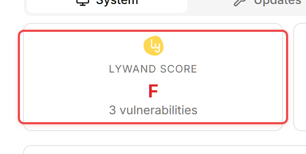 The device detail page metrics row showing the Lywand Score tile with the lywand logo, the rank letter (F for this seed device), and the "3 vulnerabilities" subline.