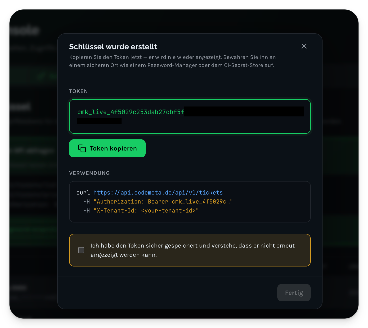 Die Bestätigung „Schlüssel wurde erstellt" in Codemeta OS mit dem einmalig angezeigten Token in einem grünen Feld, der Schaltfläche „Token kopieren", einem curl-Beispiel und einer Bestätigungs-Checkbox.