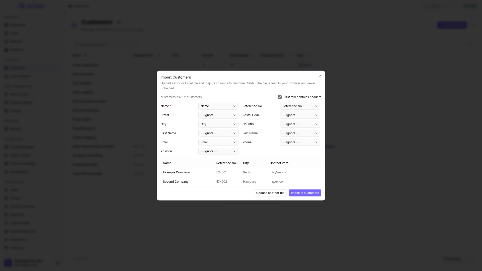 The Import Customers dialog after reading a sample file, showing column mapping, a two-customer preview, and the Import 2 customers button.